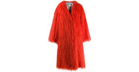 orange gucci coat|gucci orange fur coat.